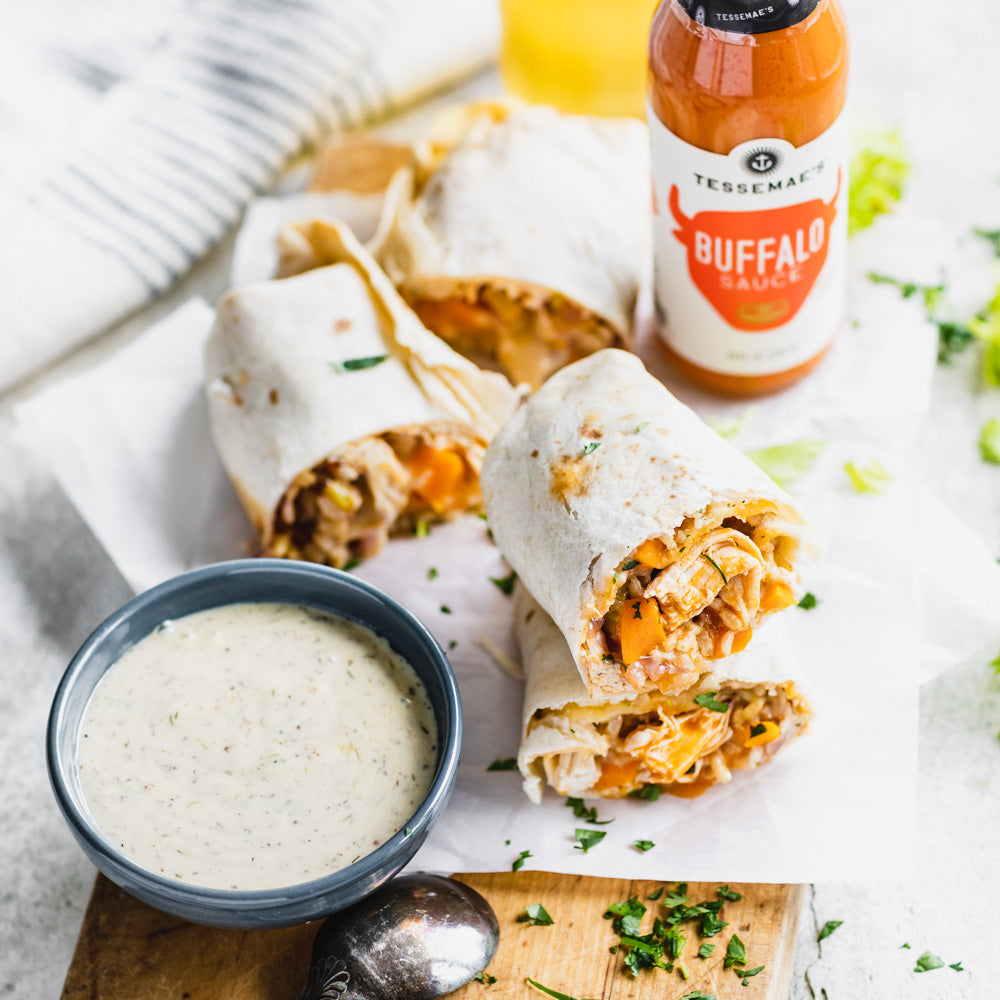 https://www.tessemaes.com/cdn/shop/articles/make-ahead-buffalo-chicken-burritos-sq-017.jpg?v=1599239517